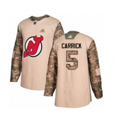 Men's New Jersey Devils #5 Connor Carrick Authentic Camo Veterans Day Practice Hockey Jersey